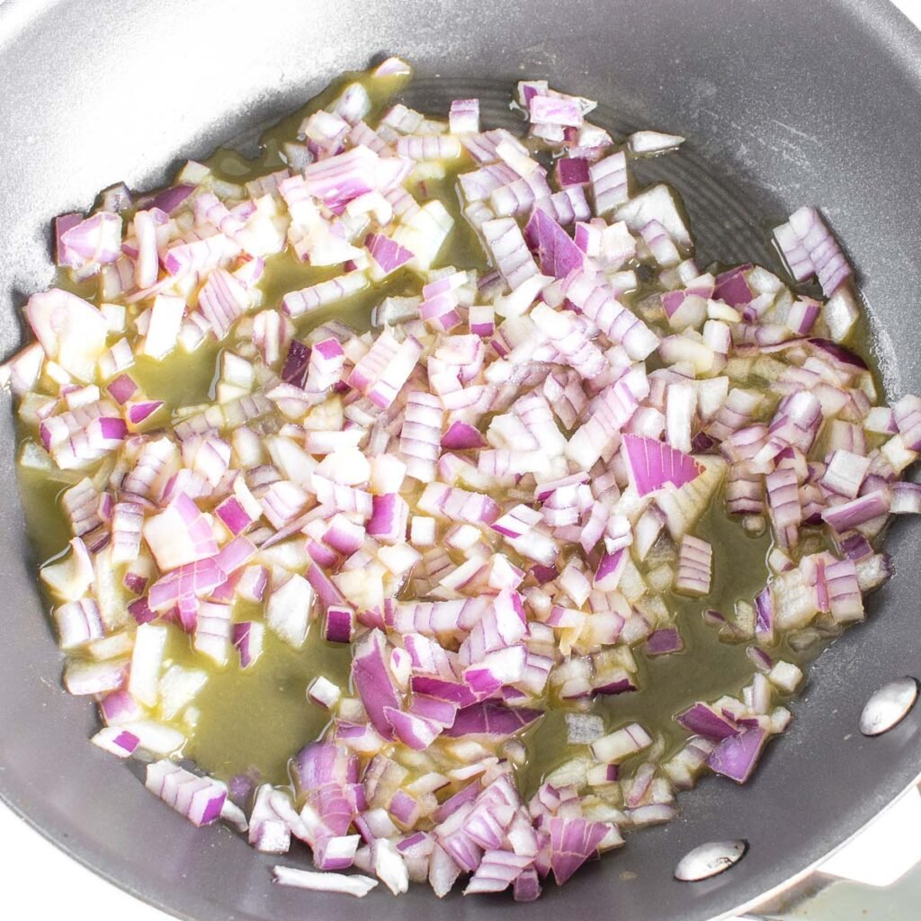 sautéed onions in the pan.