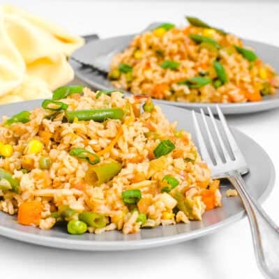 a front view of served schezwan fried rice.