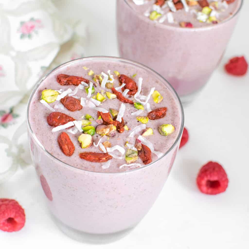 a close up view of raspberry smoothie.