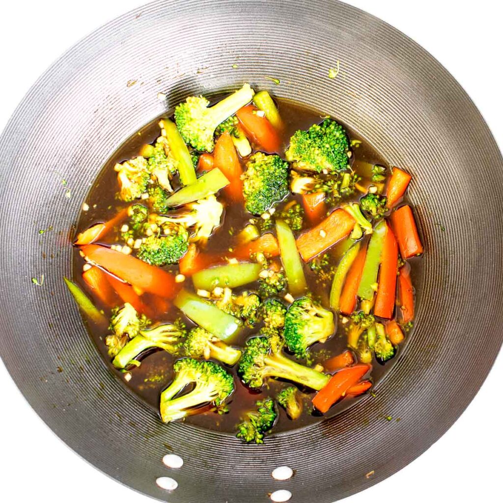 veggies cooked along with the sauce in the wok. 
