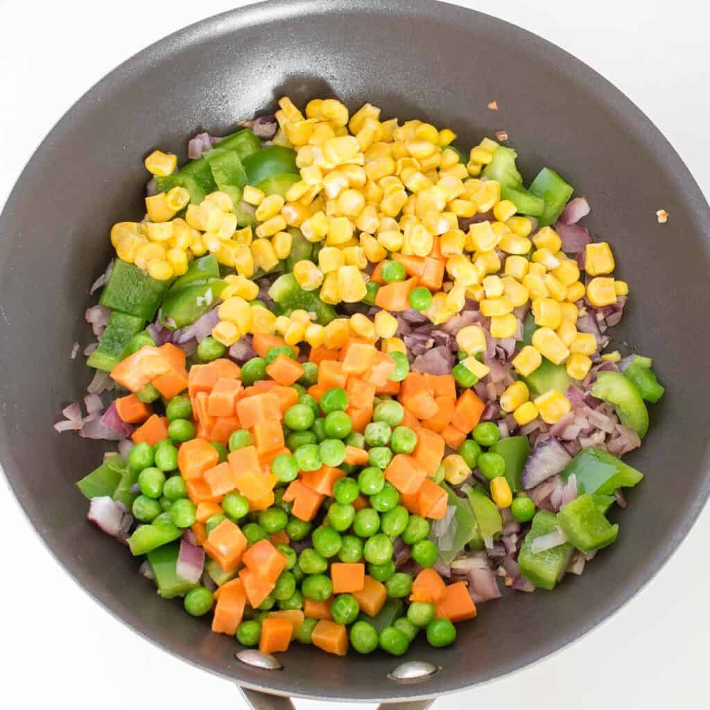 veggies tossed in the pan.