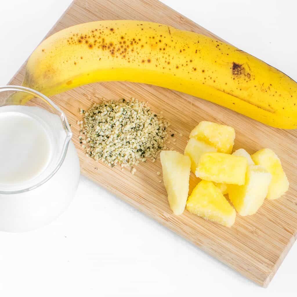 top view of raw ingredients on a wooden board.