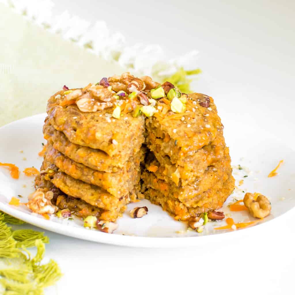 a front view of the inside of the sliced vegan carrot cake pancakes.