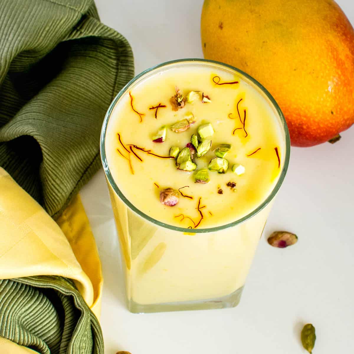 top view of garnished vegan mango lassi.