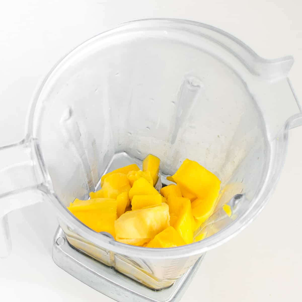 mangoes in a blender.
