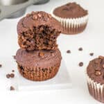 a front view of half eaten vegan chocolate muffins