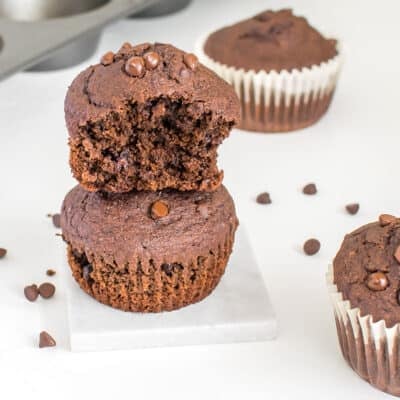 a front view of half eaten vegan chocolate muffins
