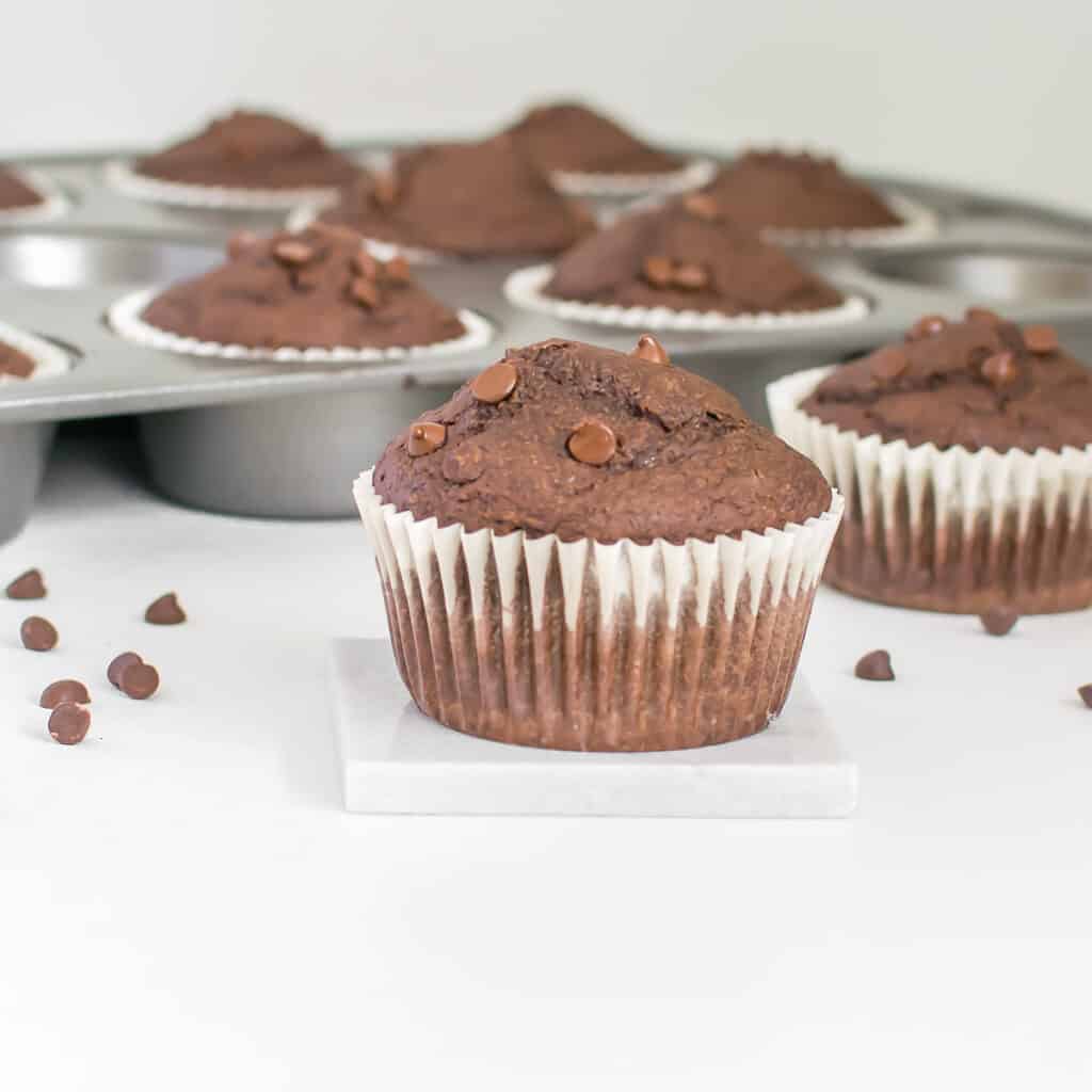 close up view of one of the vegan chocolate muffins. 