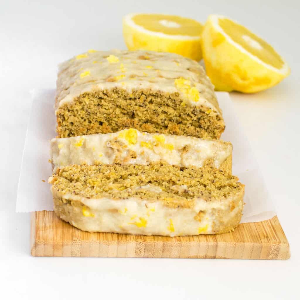 a front view of sliced vegan lemon cake. 