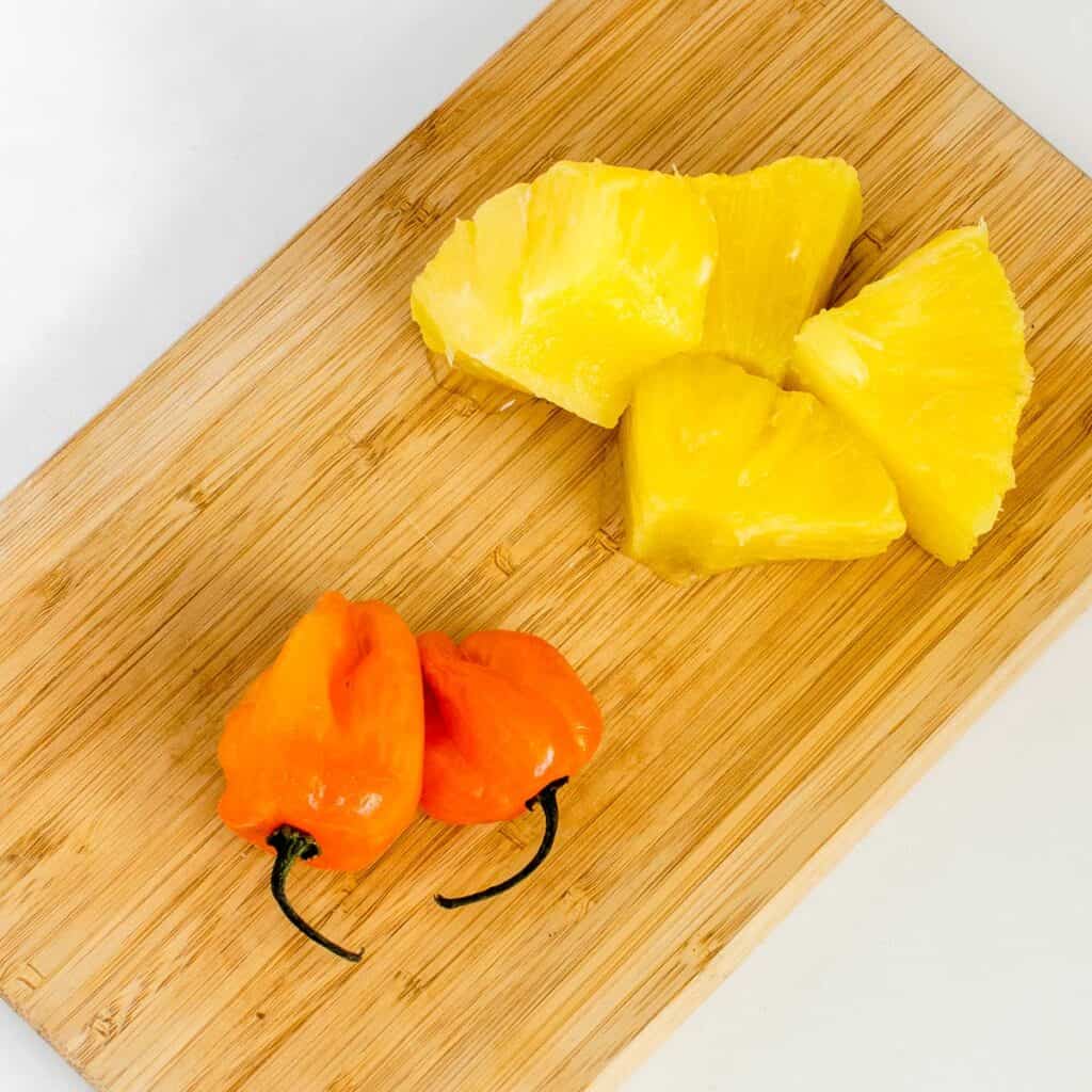 top view of raw ingredients on a wooden board.