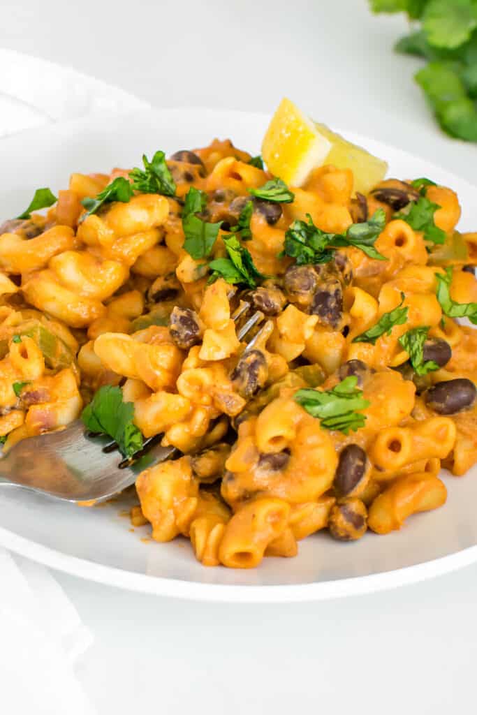 a fork in the served chipotle pasta.