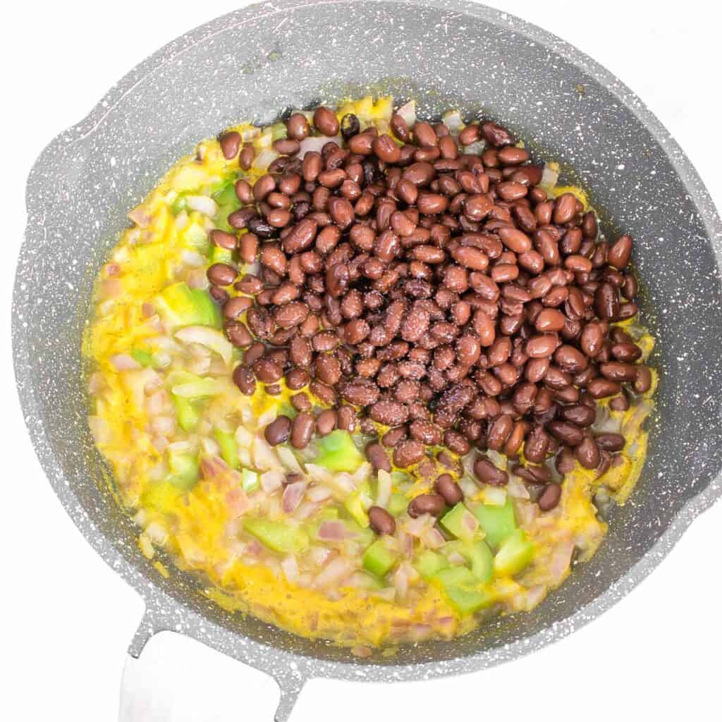 tossed black beans in the pan. 