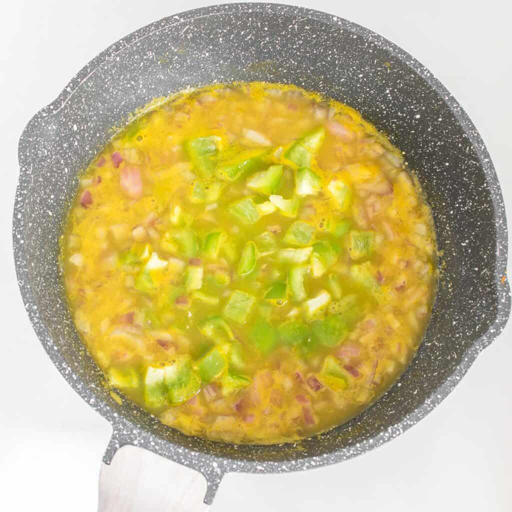 sauteed bell pepper in the pan.