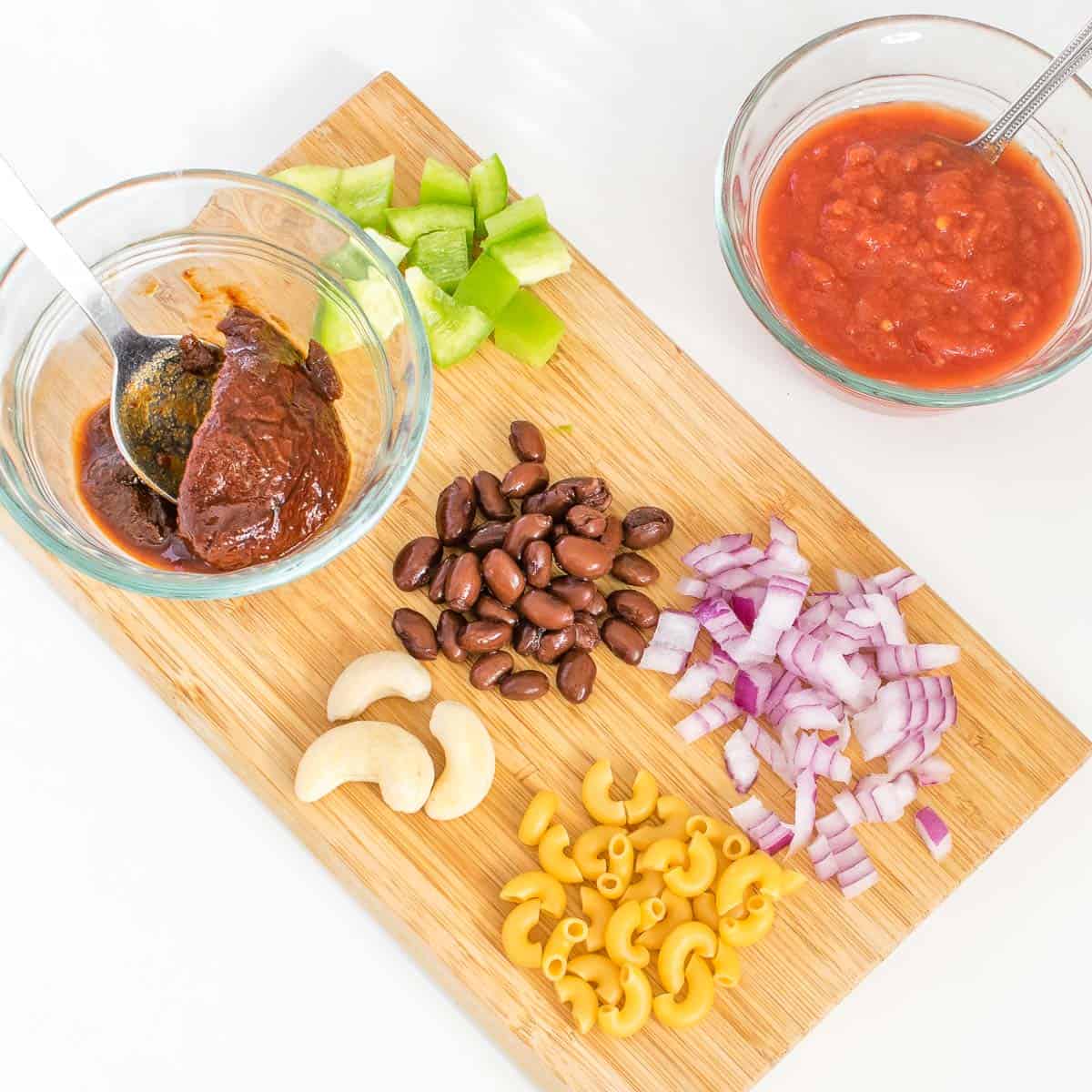 top view of raw ingredients on a wooden board.