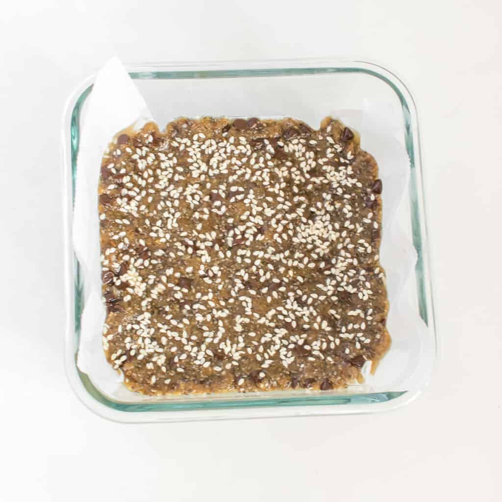 refrigerated tahini bars in the square pan. 