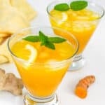 a close up view of served turmeric ginger lemonade