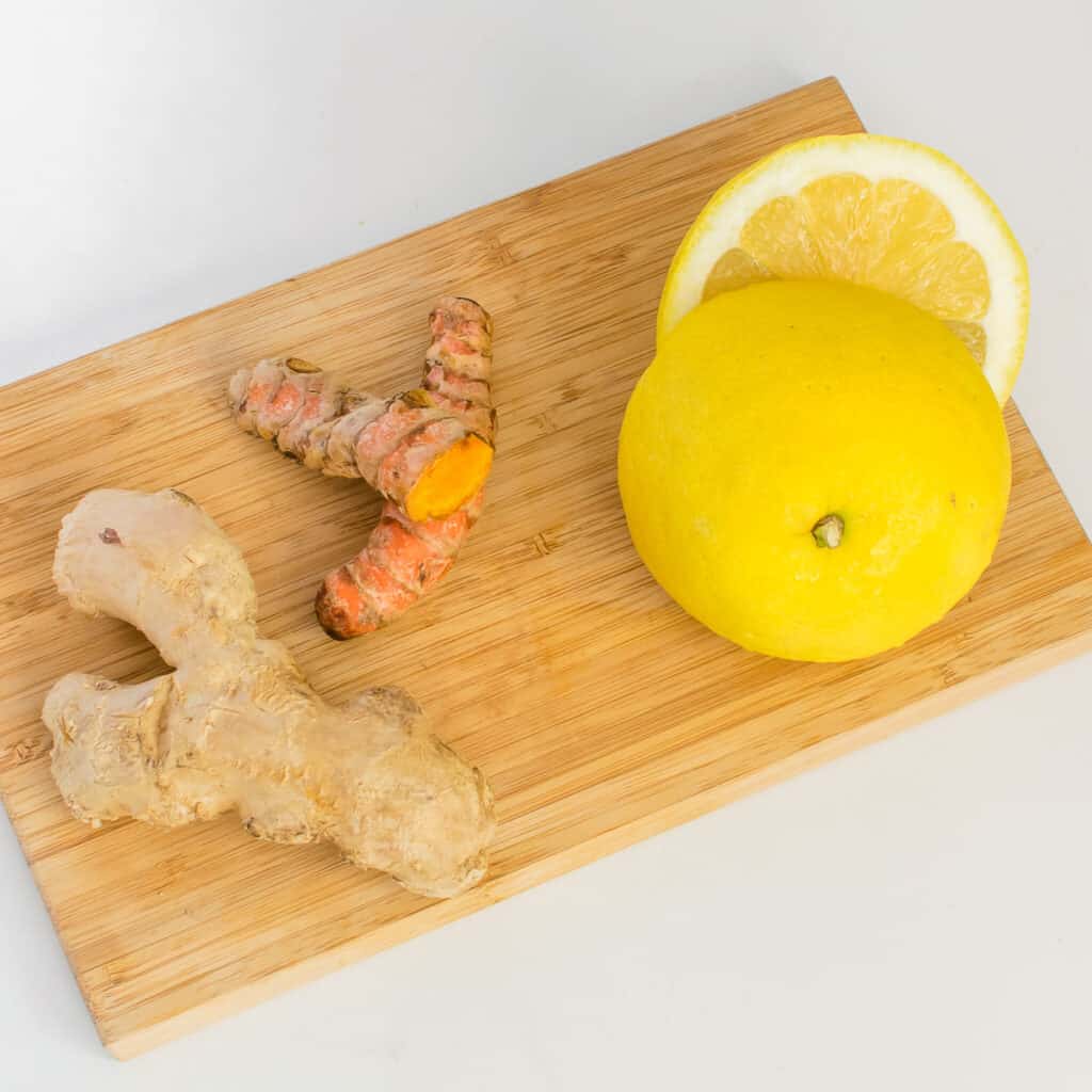 top view of raw ingredients on a wooden board.