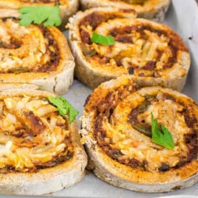 a close up view of vegan pizza rolls.