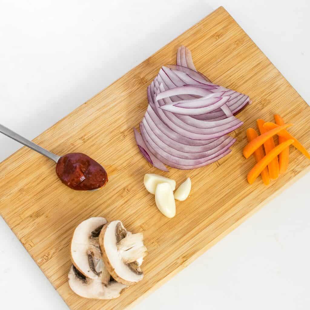 raw ingredients on a wooden board. 