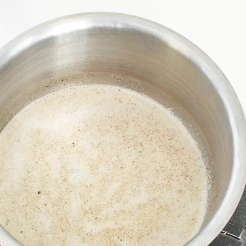 blended milk in a saucepan. 