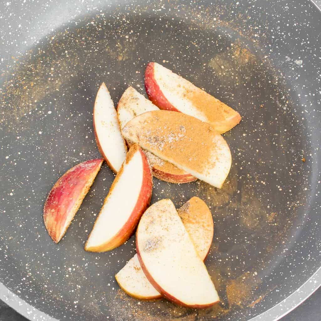 cooked apples in a pan. 