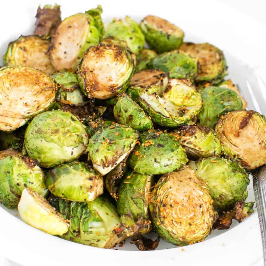 a close up view of served air fryer brussels sprouts. 