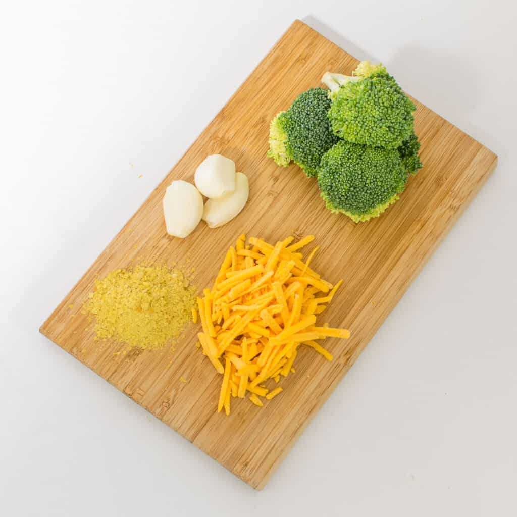 top view of raw ingredients on a wooden board.