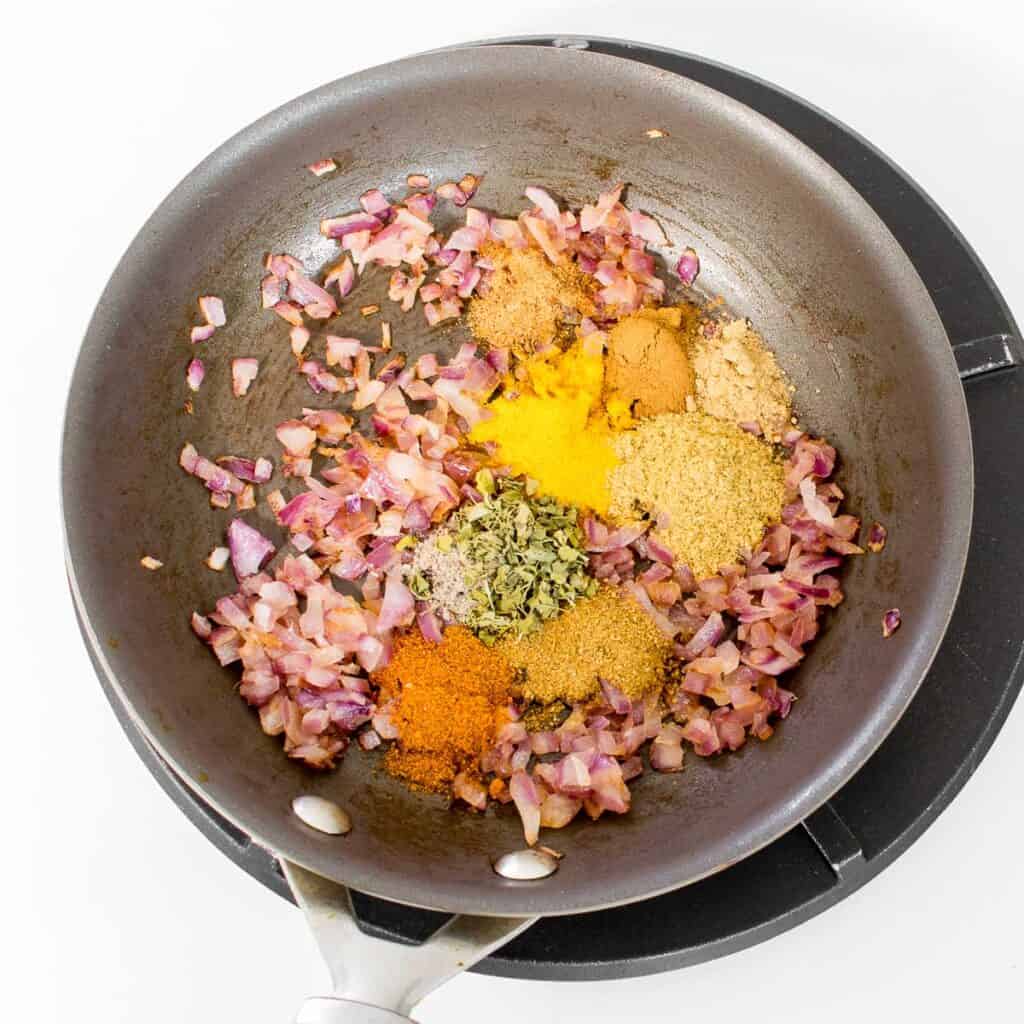 all the spices in the nonstick pan. 