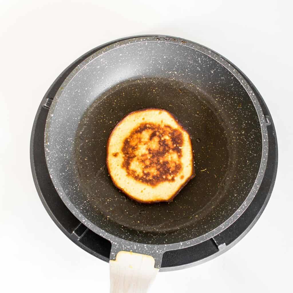 cooked pancake in the pan. 