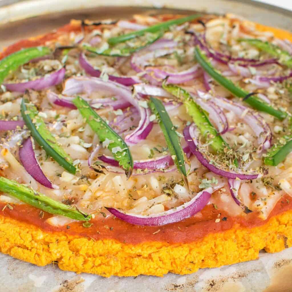 full view of sweet potato pizza crust with its toppings. 