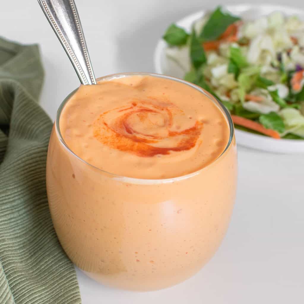 a glass jar filled with silken tofu salad dressing. 