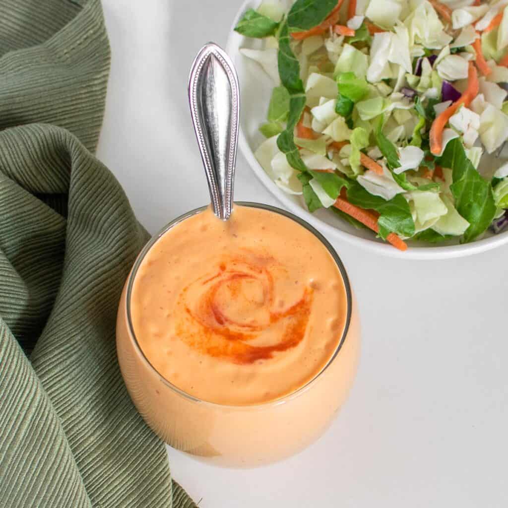 top view of silken tofu salad dressing in a glass jar. 