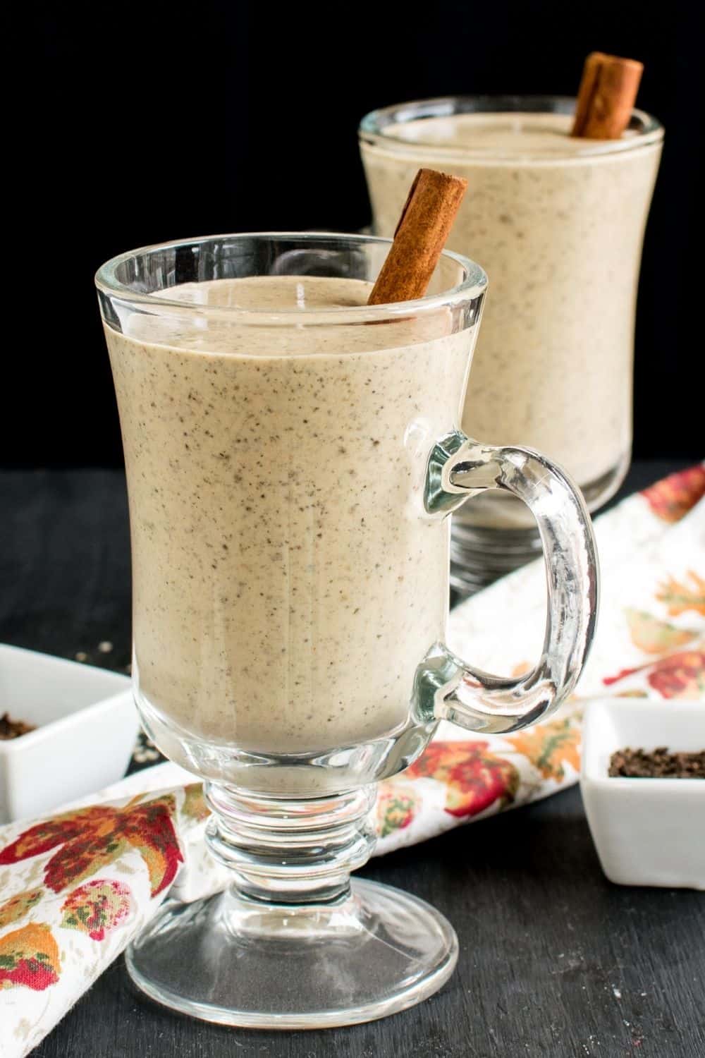 tall glass mugs filled with chai smoothie. 