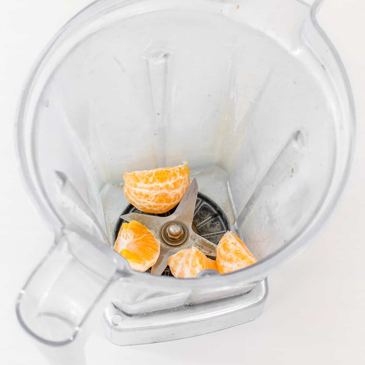 peeled oranges in the blender. 