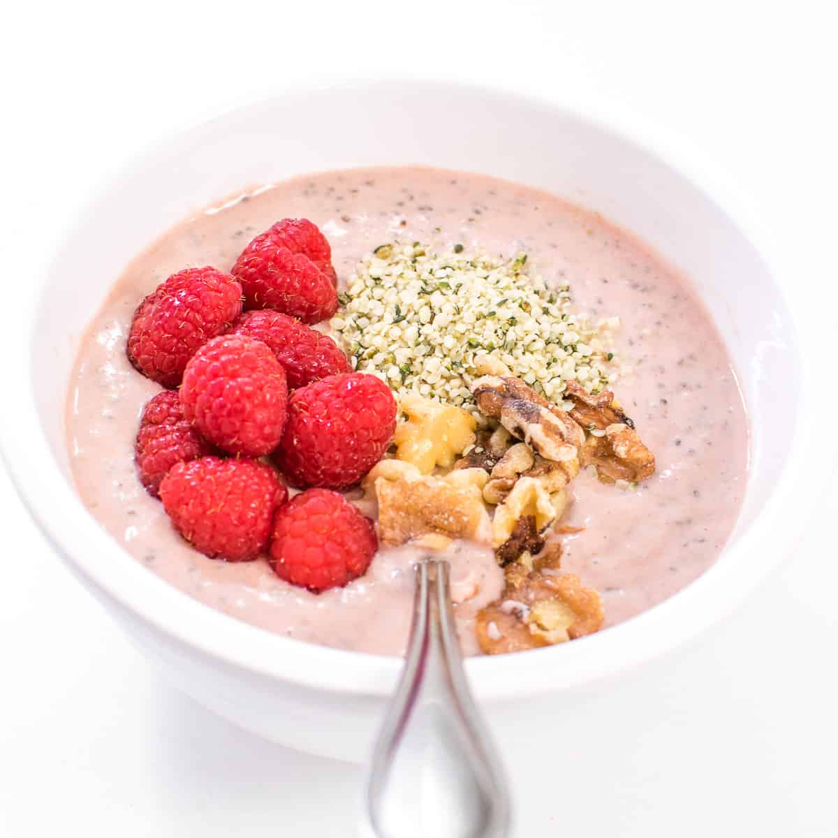 front view of the served raspberry smoothie bowl. 