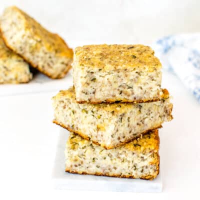 stacked banana protein bars with some as the backdrop too.