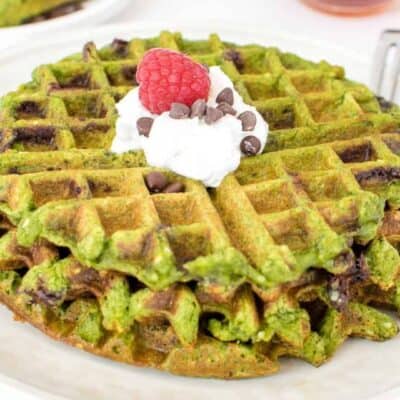 a 45 degree angle view of served green waffles.