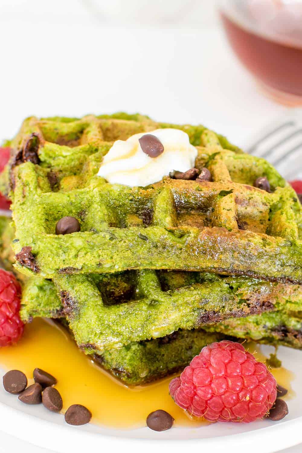 served green waffles with garnishes. 