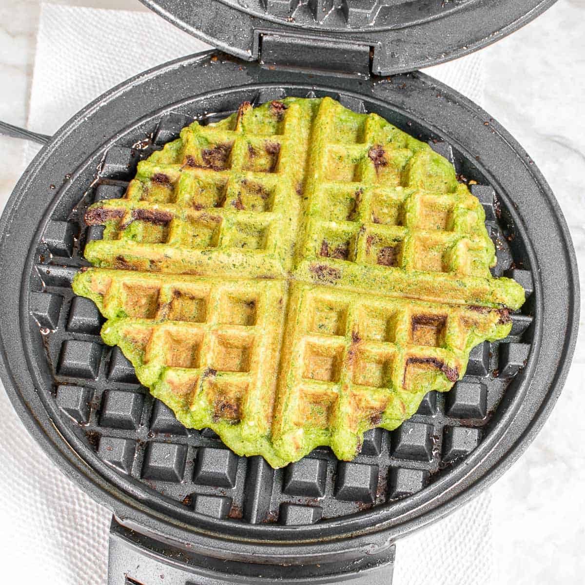 cooked waffles in the waffle maker. 