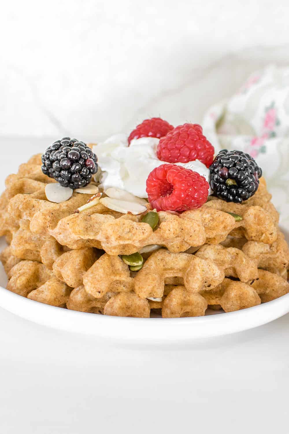 a front view of stacked vegan protein waffles. 
