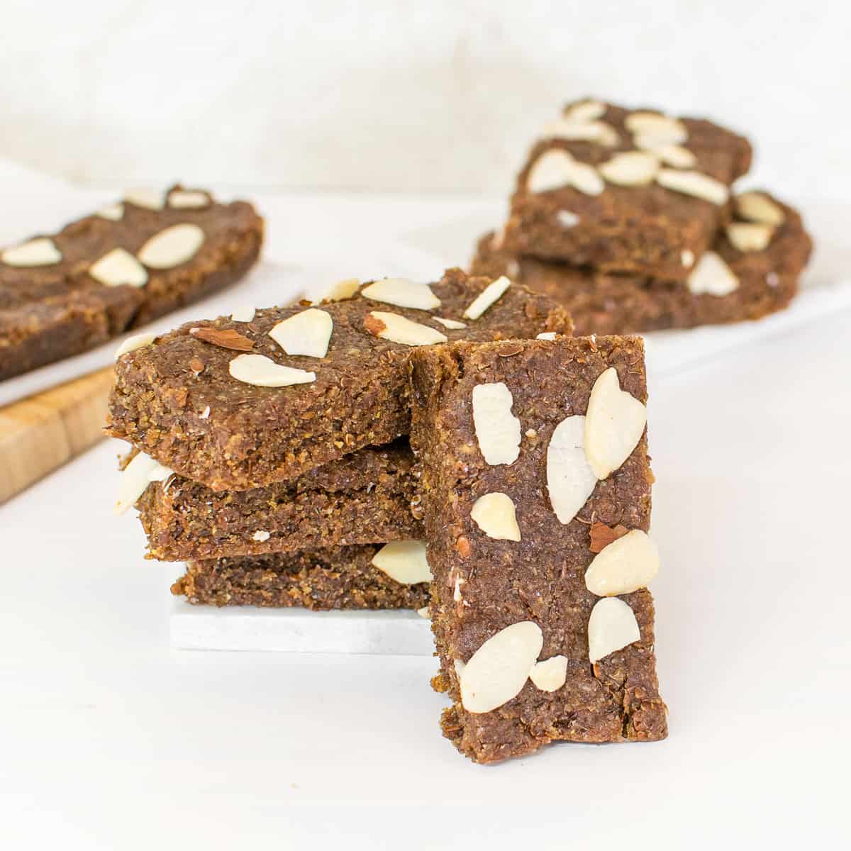 a front view of no bake flaxseed bars supported by its stack.