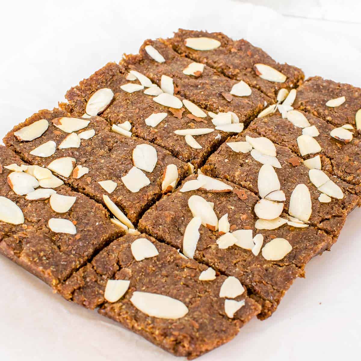 a 45 degree angle view of sliced flaxseed bars. 