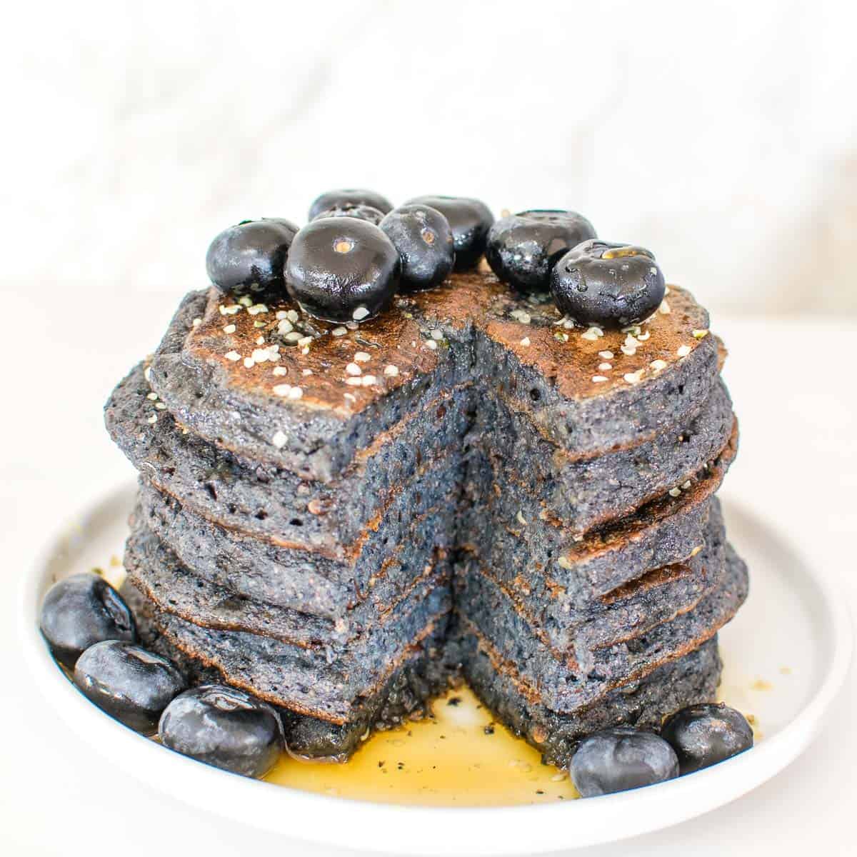 inside view of stacked vegan blueberry spelt pancakes. 