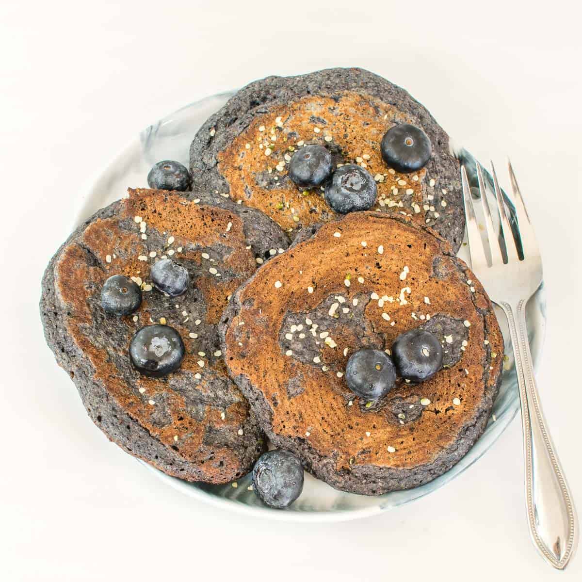 top view of vegan blueberry spelt flour pancakes. 