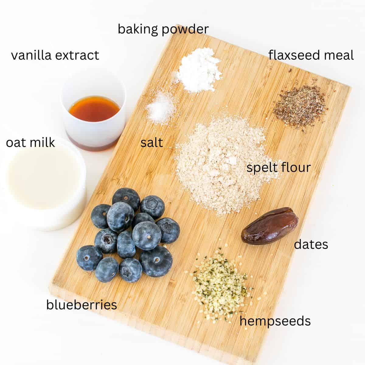 top view of raw ingredients on a wooden board.