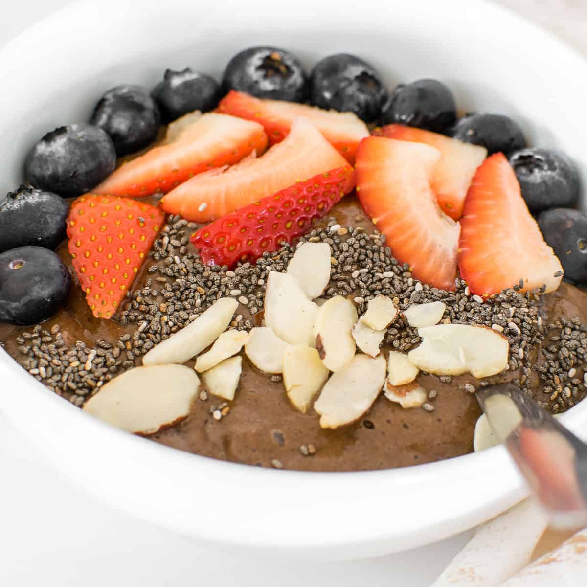 a close up view of served coffee smoothie bowl.