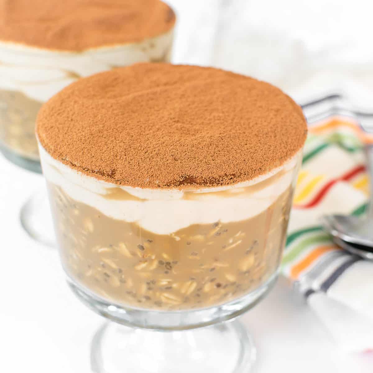a front close up view of refrigerated and settled tiramisu overnight oats.