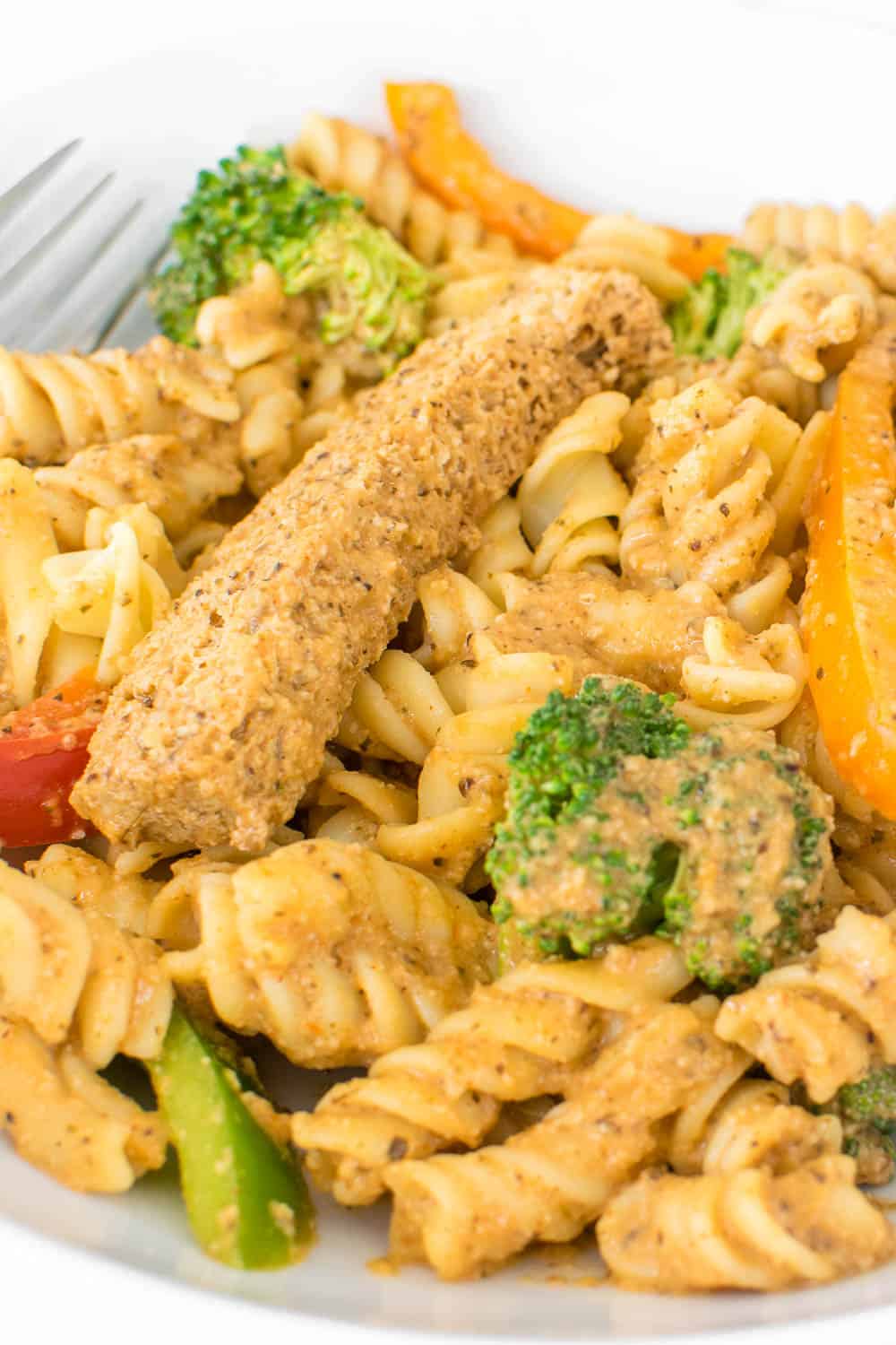 a close up view of the served cajun pasta. 