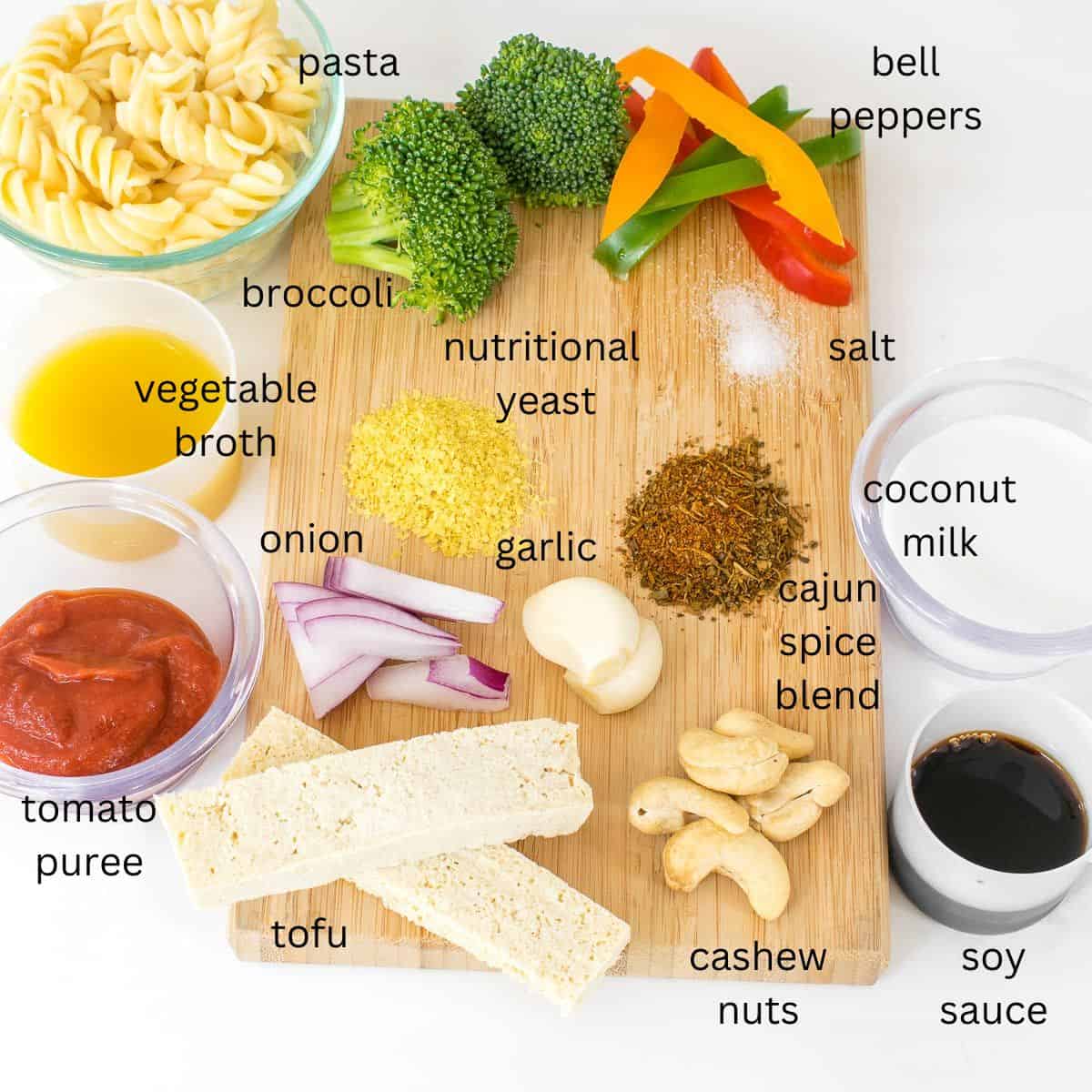 top view of all raw ingredients on a wooden board.