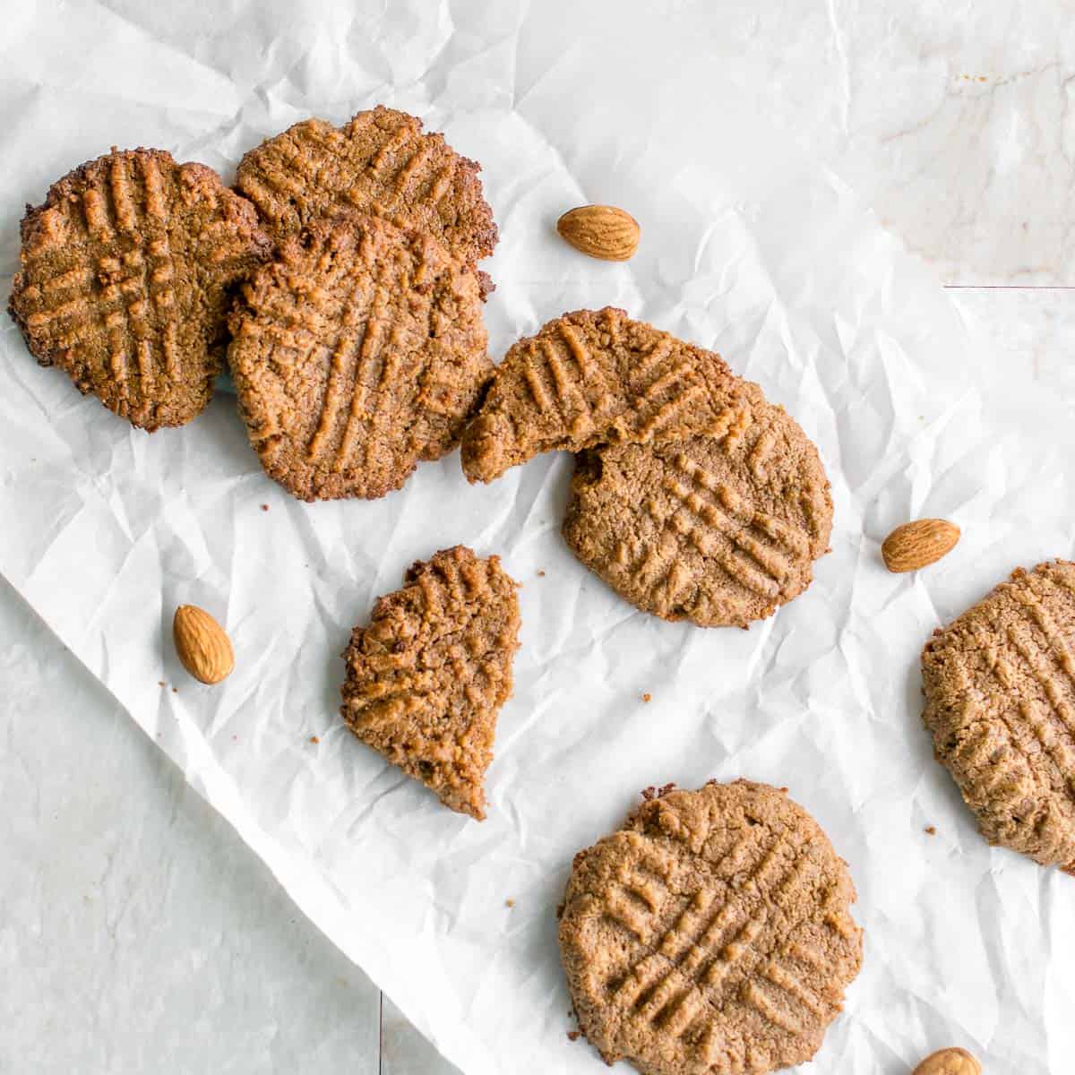 top view of vegan almond butter cookies on a parchment paper.